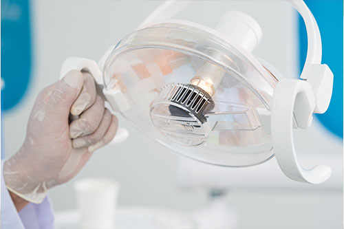 Dentist showing proper brushing technique